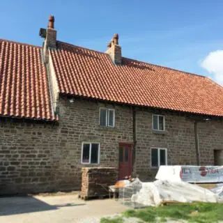 Ladies and Gents, we give you the ‘hall’ at Woodhall. Customer has taken on a big project with this 1300’s grade 2* village hall. Sandtoft old English pantiles and lead work formed by @jameslloyd_leadwork  #stone #old #heritage #listedbuilding #pantiles #peakdistrict #sheffield #roof #roofing #lead #chimney #cottagestyle #cottage @wienerbergeruk